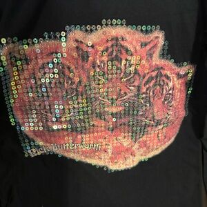 New POL Black long sleeve tiger tshirt. Has sequins. Much better in person